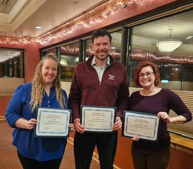 Dr. Sean Timpane receiving an award
